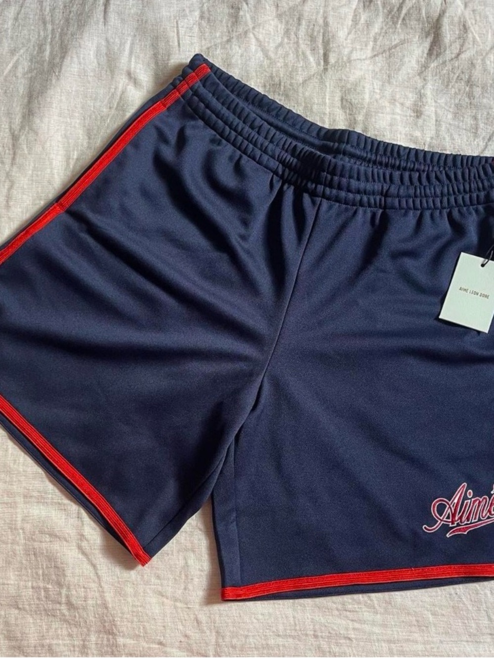Aime Leon Dore Navy Shorts with Red Trim